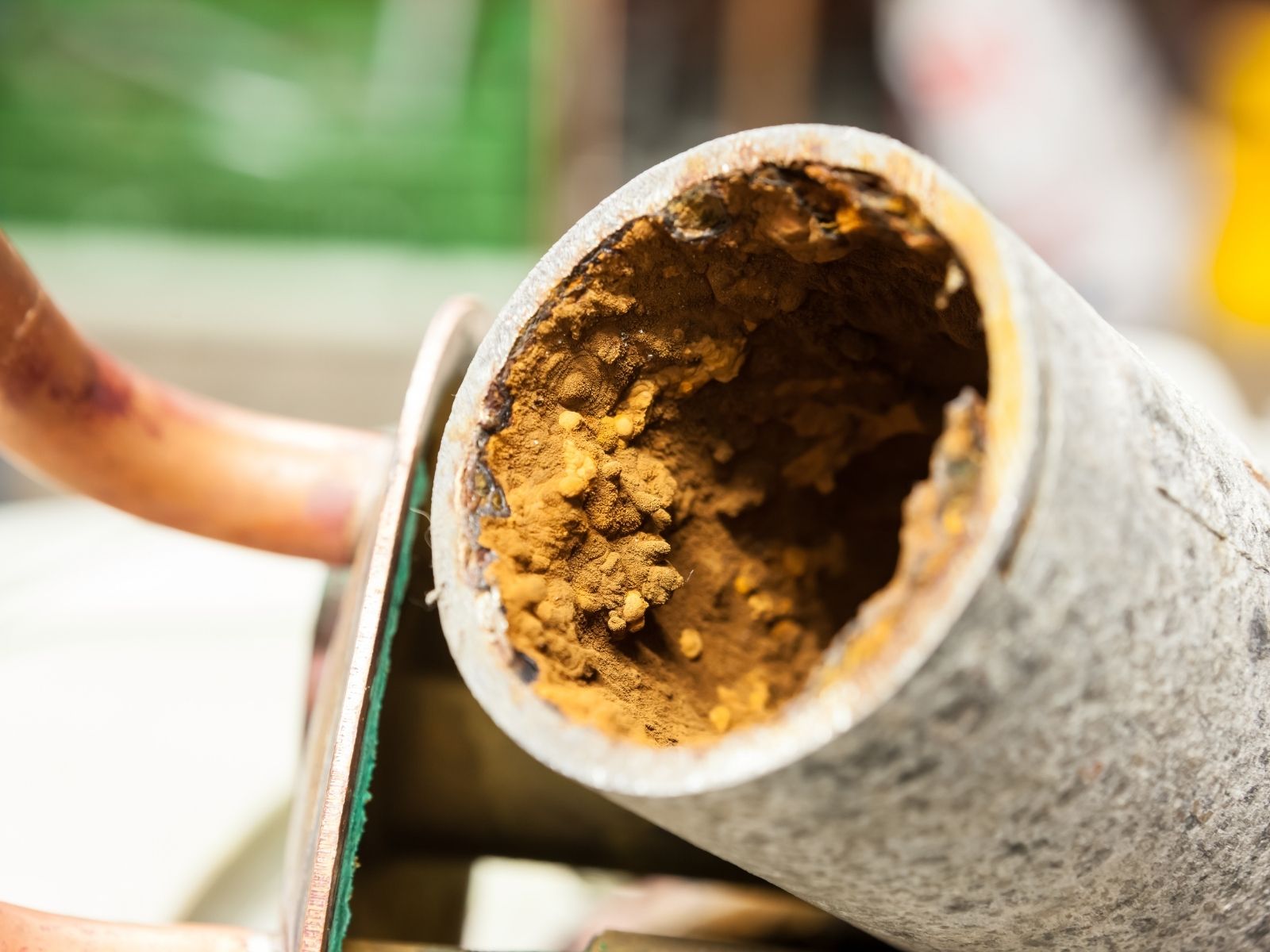 image of aging galvanized pipe showing interior corrosion